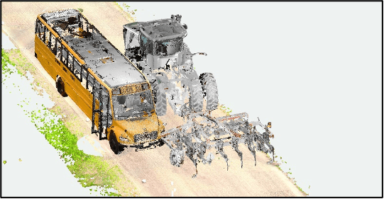 Mock up of bus and tractor before collision